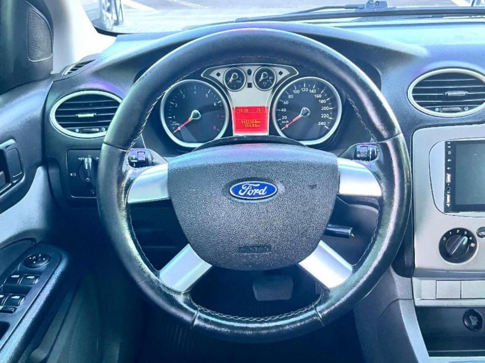 Focus sedan - foto 18
